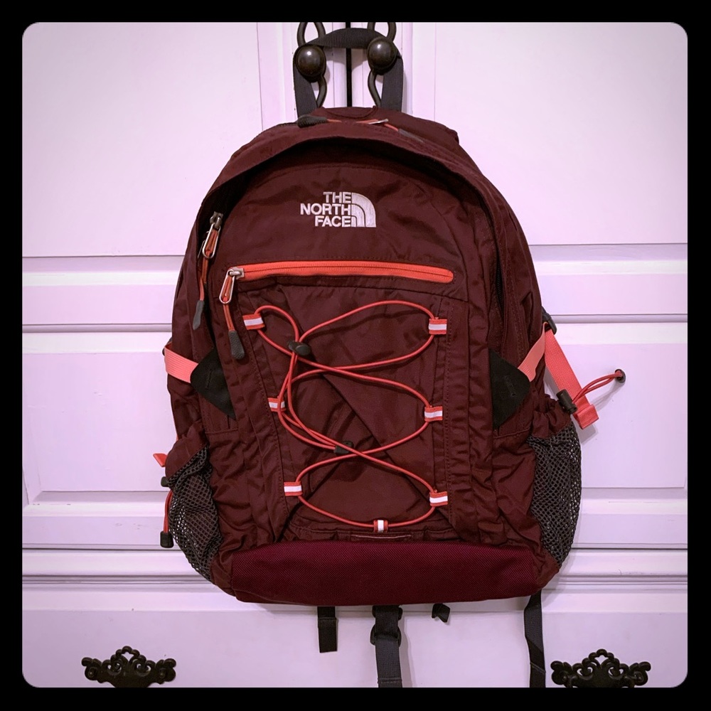 Maroon and pink north face borealis backpack